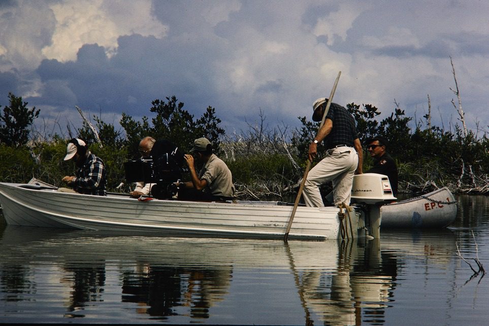 NPS employees filming from a boat in Everglades National Park. Photo courtesy of U.S. National Park Service Credit: Wilbur “Bud” E. Dutton